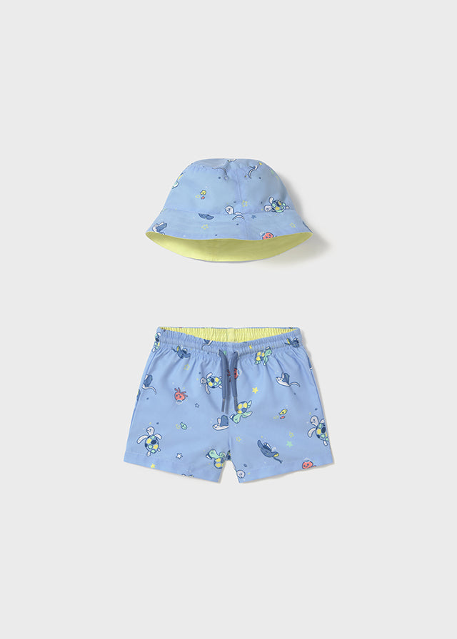 Sett med badeshorts og solhatt blå