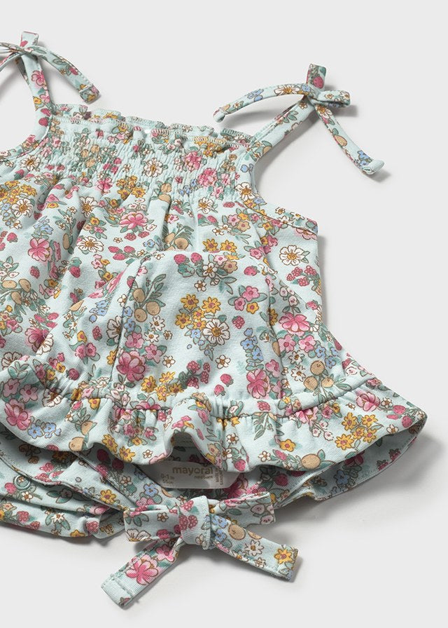 Romper og solhatt små blomster